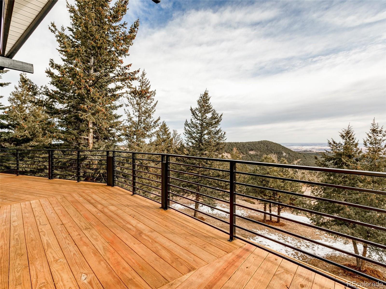 442 Deer Trail Road Boulder, CO 80302 - Photo 33 of 40 a view of a terrace with sky view