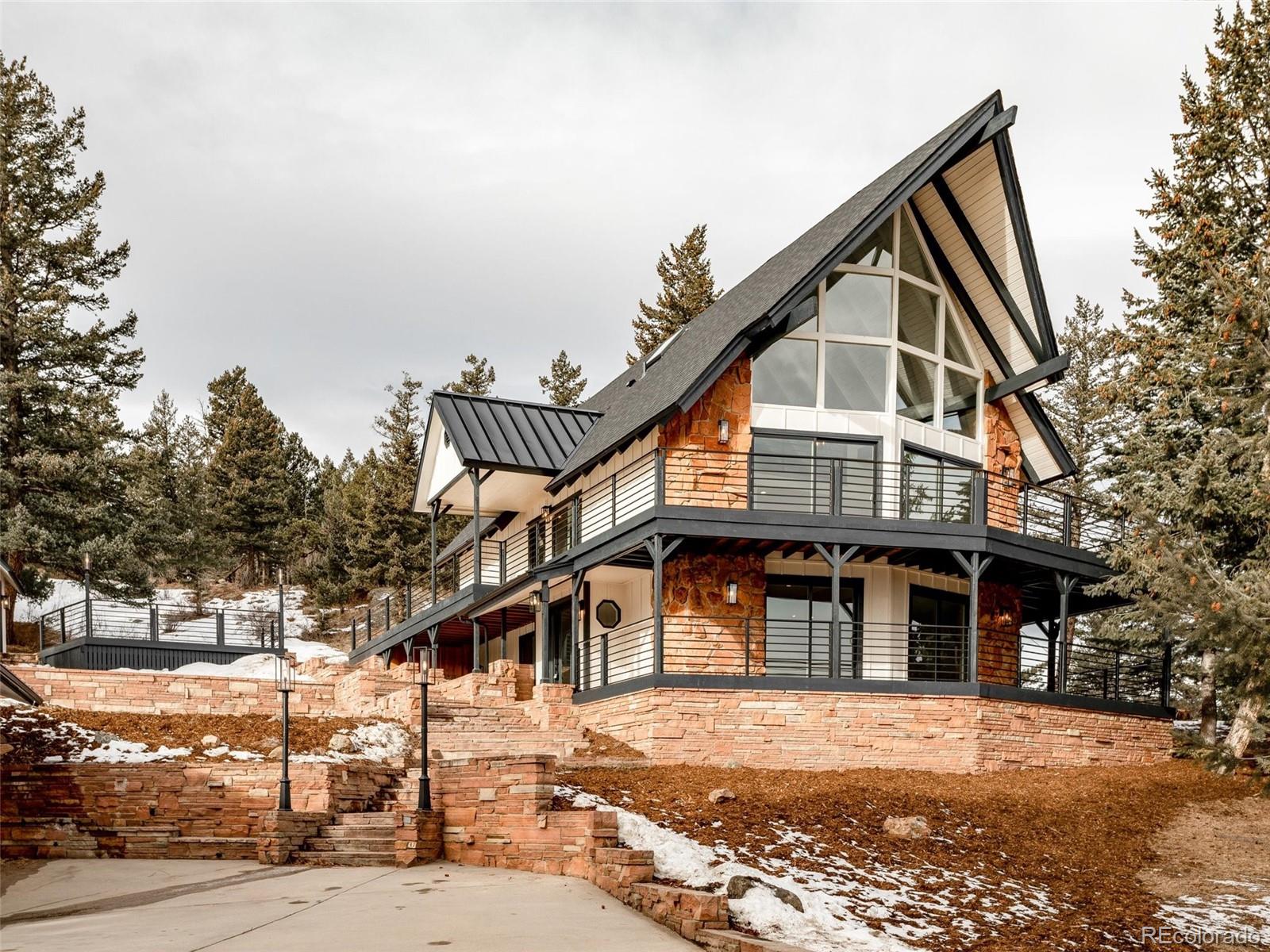 442 Deer Trail Road Boulder, CO 80302 - Photo 39 of 40 a front view of a house with a yard