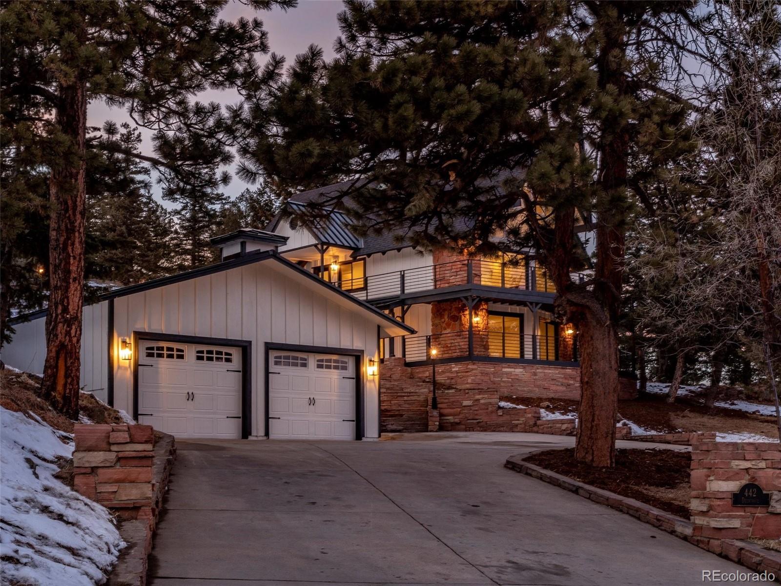 442 Deer Trail Road Boulder, CO 80302 - Photo 5 of 40 a front view of a house with a yard