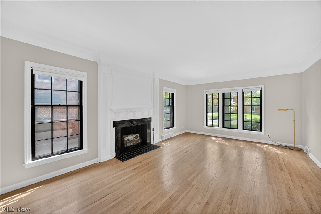 2561 Charney Road Cleveland, OH 44118 - Photo 5 of 47 The spacious Living Room is graced with a newly refinished floor