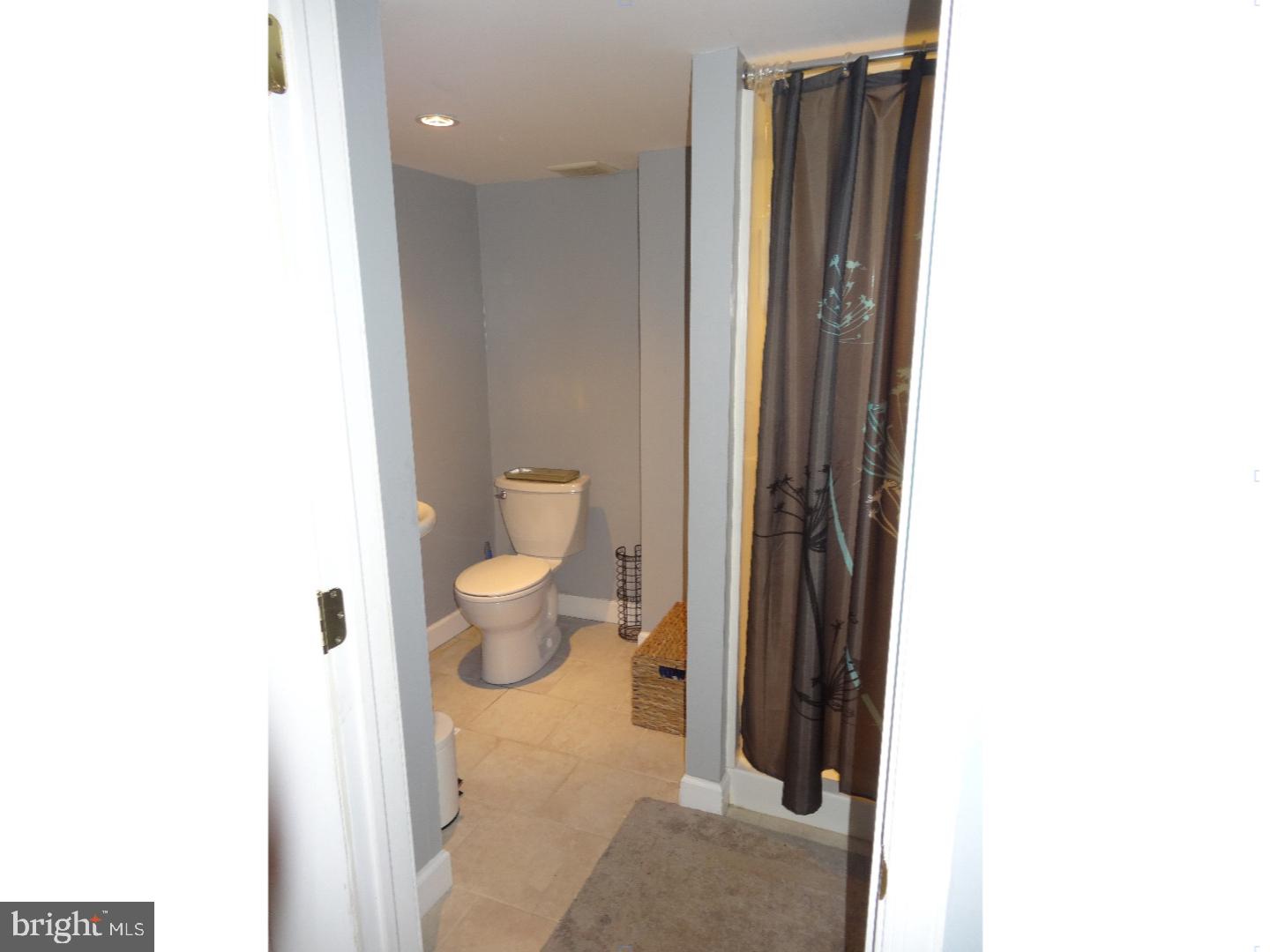 310 Ripka Street Philadelphia, PA 19128 - Photo 14 of 14 a bathroom with a toilet and a shower
