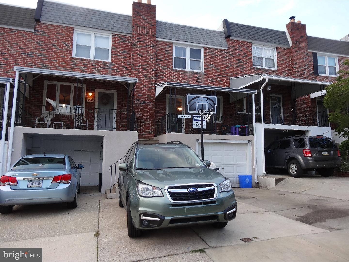 310 Ripka Street Philadelphia, PA 19128 - Photo 3 of 14 a car parked in front of a building