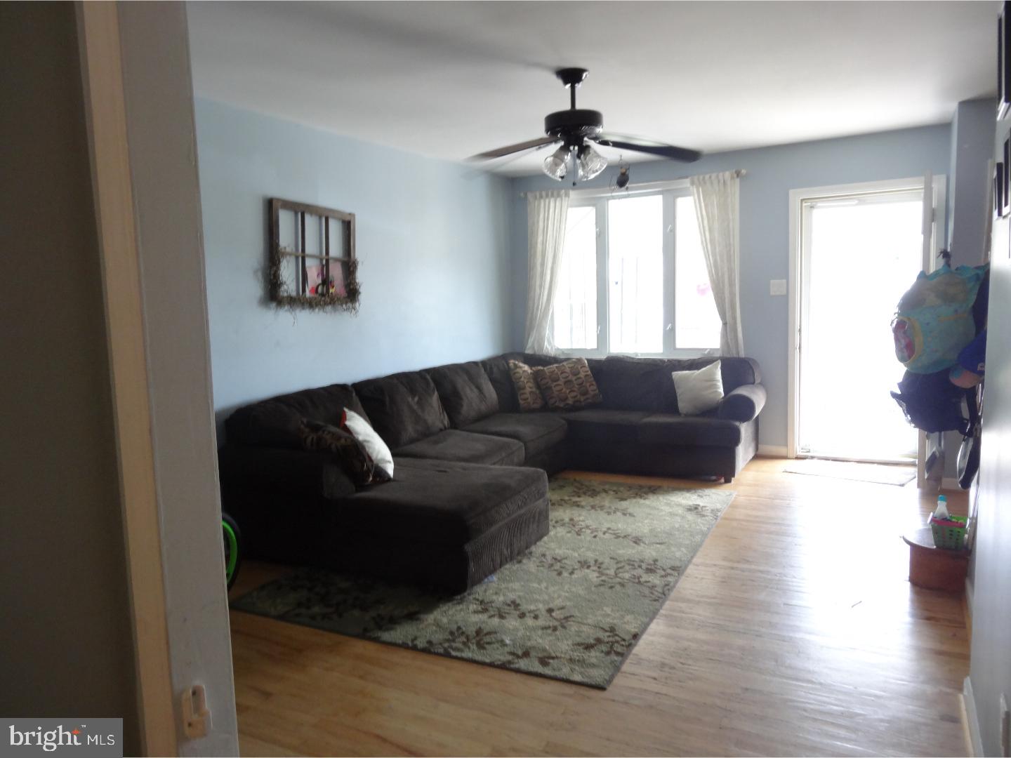 310 Ripka Street Philadelphia, PA 19128 - Photo 4 of 14 a living room with furniture and a window