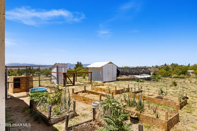 a view of a lake with a building in the background
