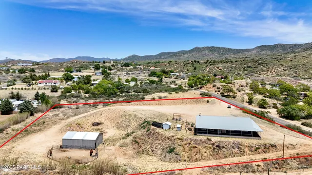 an aerial view of residential house with parking space