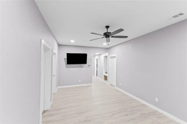 a view of a livingroom with a flat screen tv