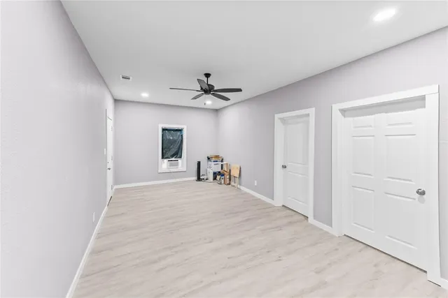 a view of a livingroom with a ceiling fan