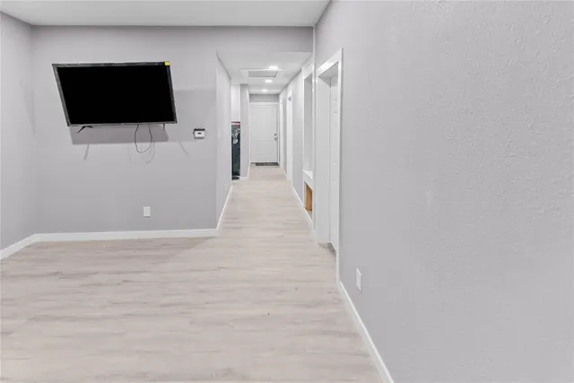 a view of a livingroom with a flat screen tv