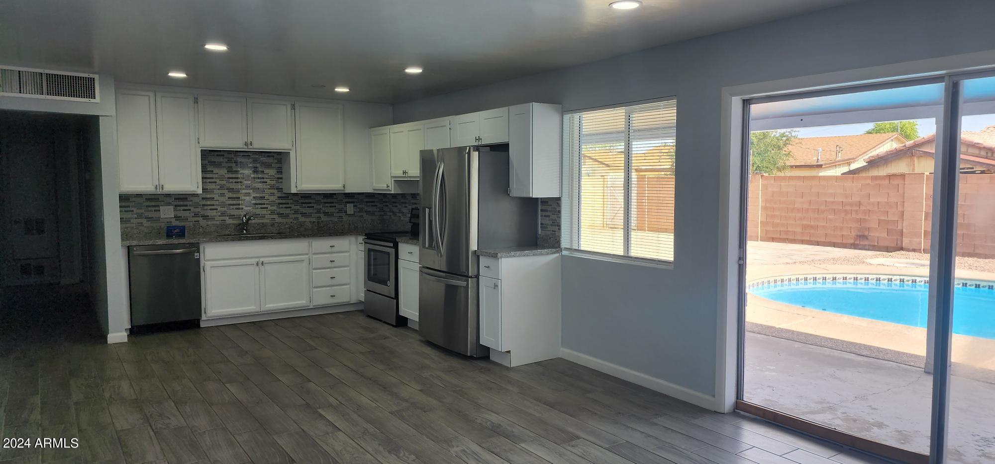 3237 West Wethersfield Road Phoenix, AZ 85029 - Photo 7 of 31 20240609_155244