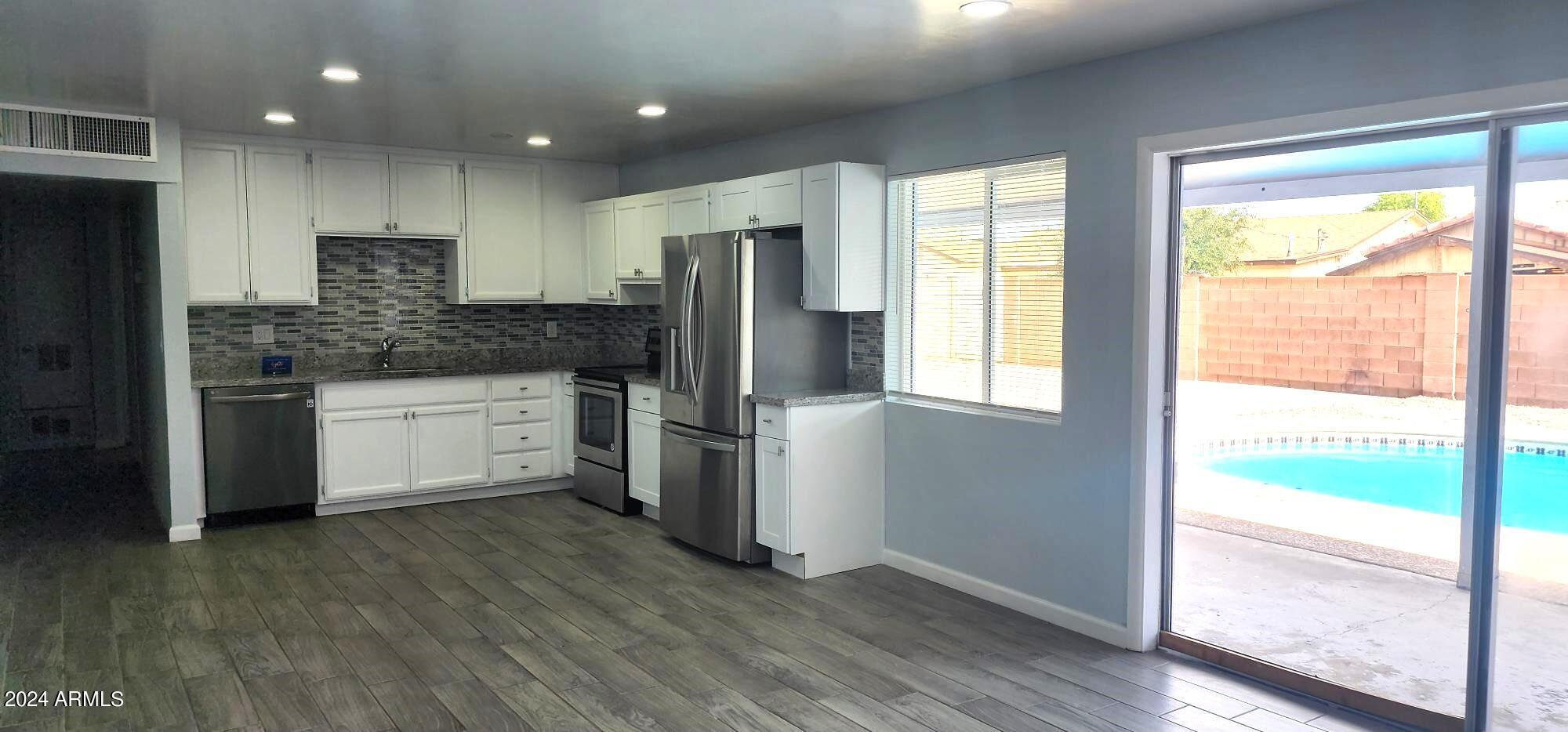 3237 West Wethersfield Road Phoenix, AZ 85029 - Photo 8 of 31 20240609_155244