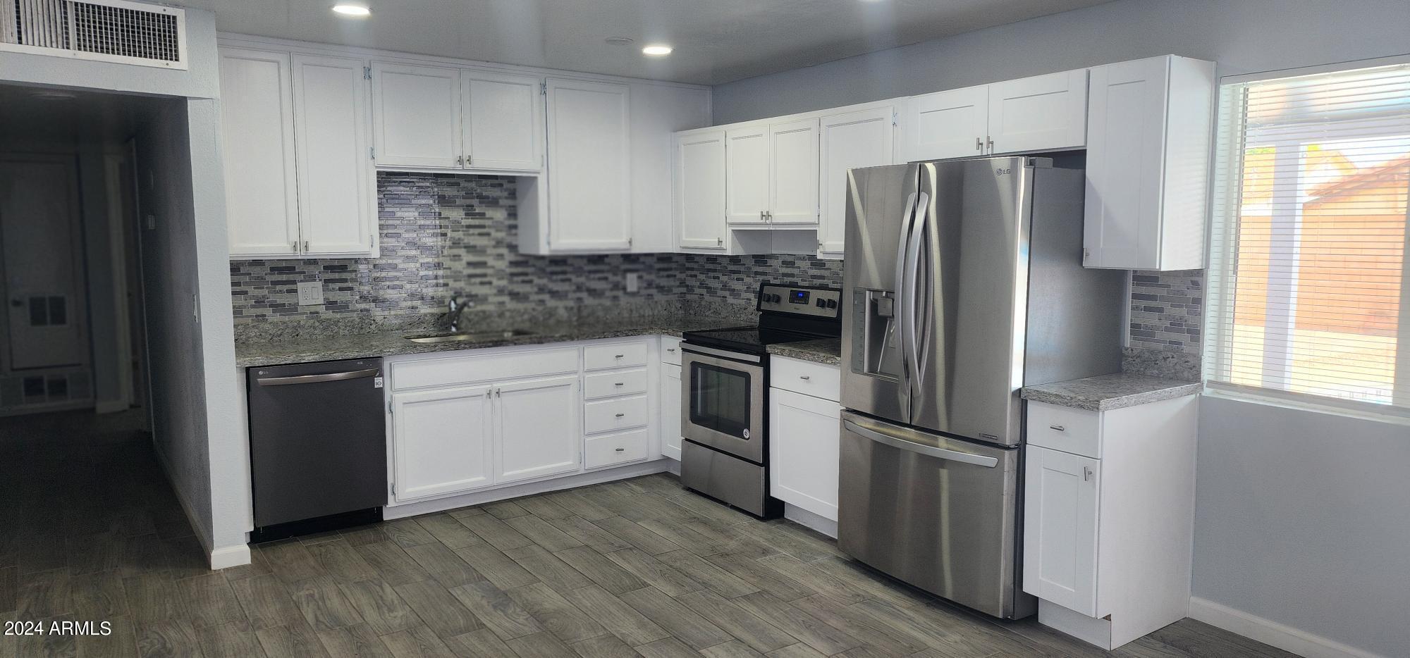 3237 West Wethersfield Road Phoenix, AZ 85029 - Photo 9 of 31 20240609_154650