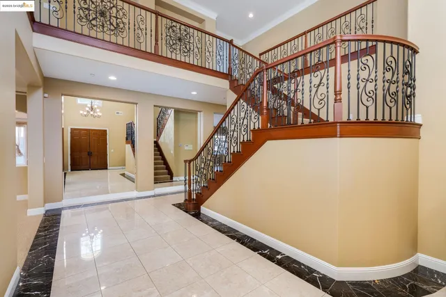 a view of a hallway with staircase