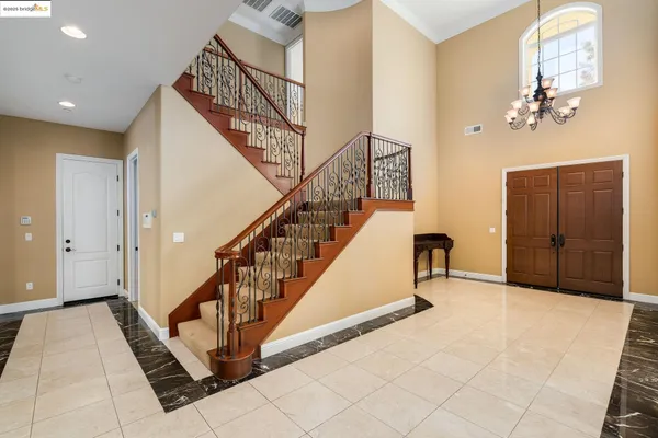 a view of a hallway with staircase