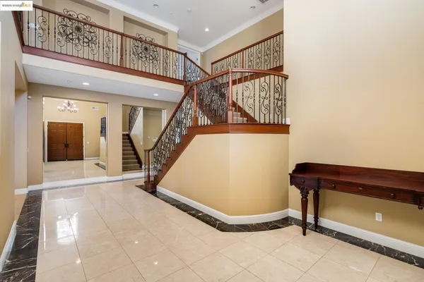 a view of a hallway with staircase