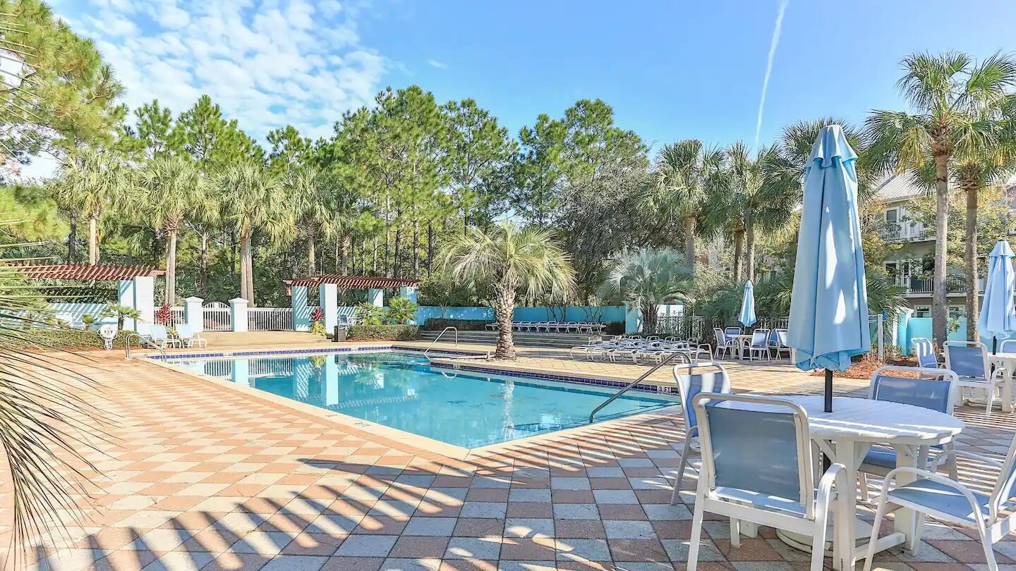 16 West Henry Court Santa Rosa Beach, FL 32459 - Photo 4 of 5 a view of swimming pool with outdoor seating and plants