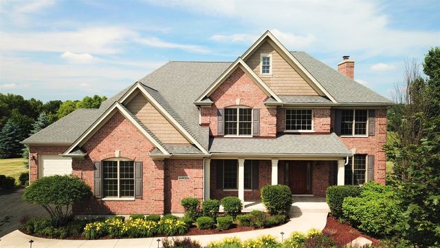 41W310 Campton Trail Road St. Charles, IL 60175 - Photo 1 of 1 a front view of a house with garden