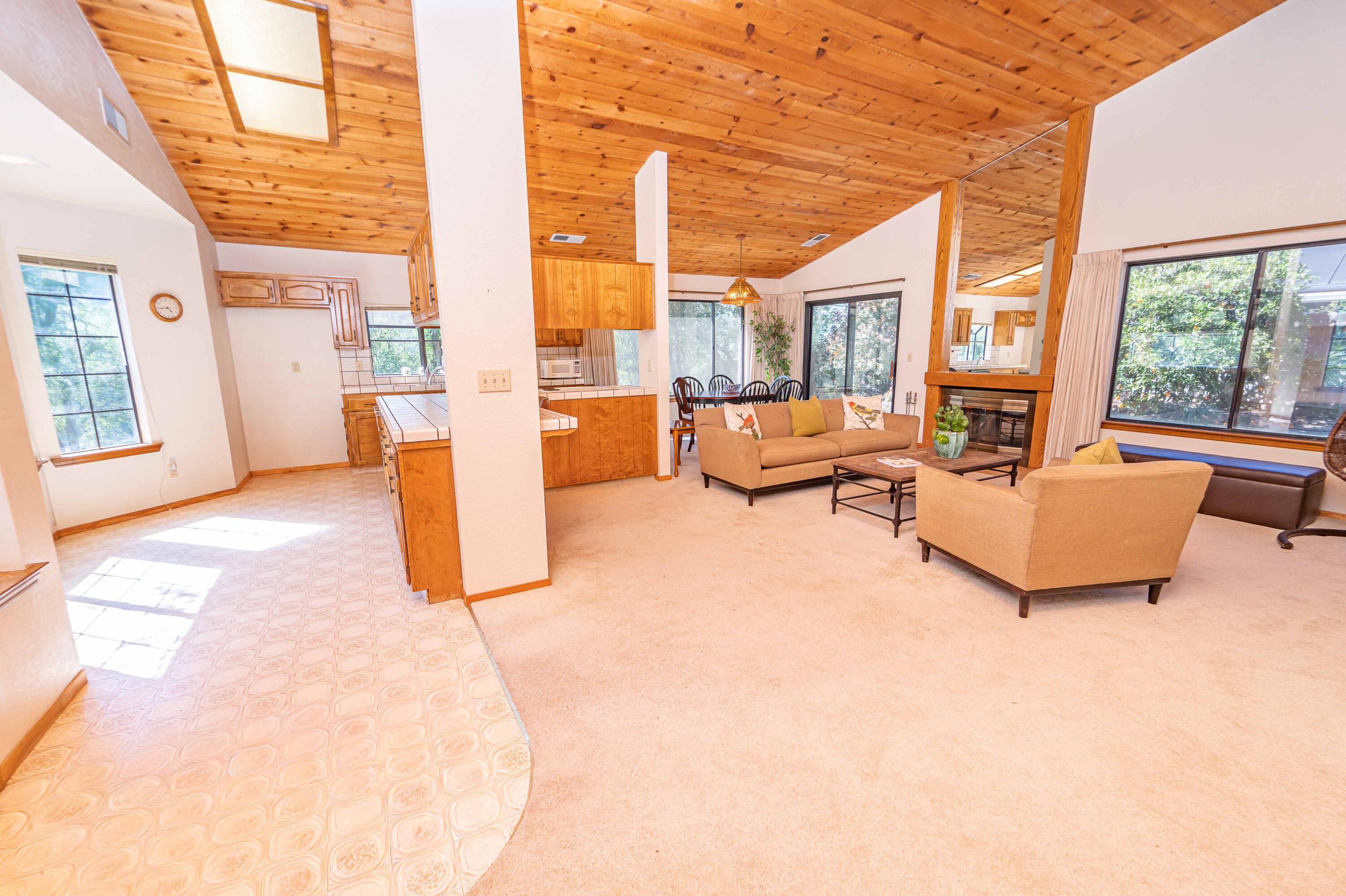 40962 Oak Ridge Drive Three Rivers, CA 93271 - Photo 11 of 36 a living room with furniture and a large window