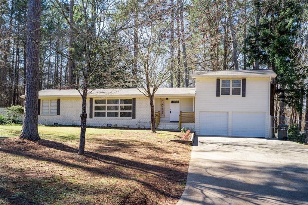 3011 Dry Pond Road Monroe, GA 30656 - Photo 1 of 1 a view of a house with snow on the road