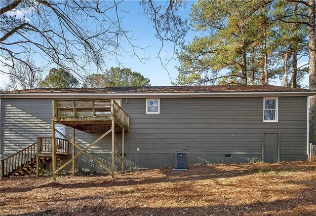 a view of a house with snow on the wall