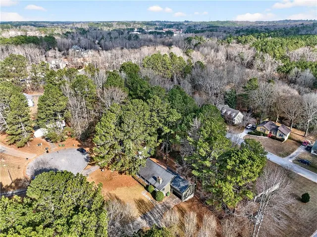 an aerial view of residential house with outdoor space
