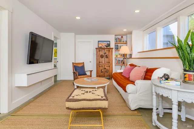 a bathroom with double vanity sinks and a mirror