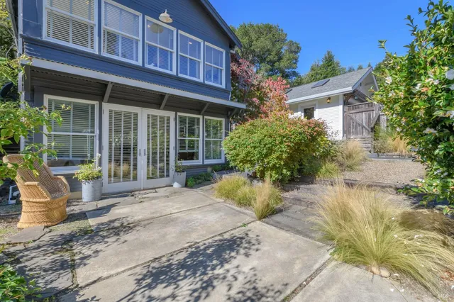 a view of a building with sitting area