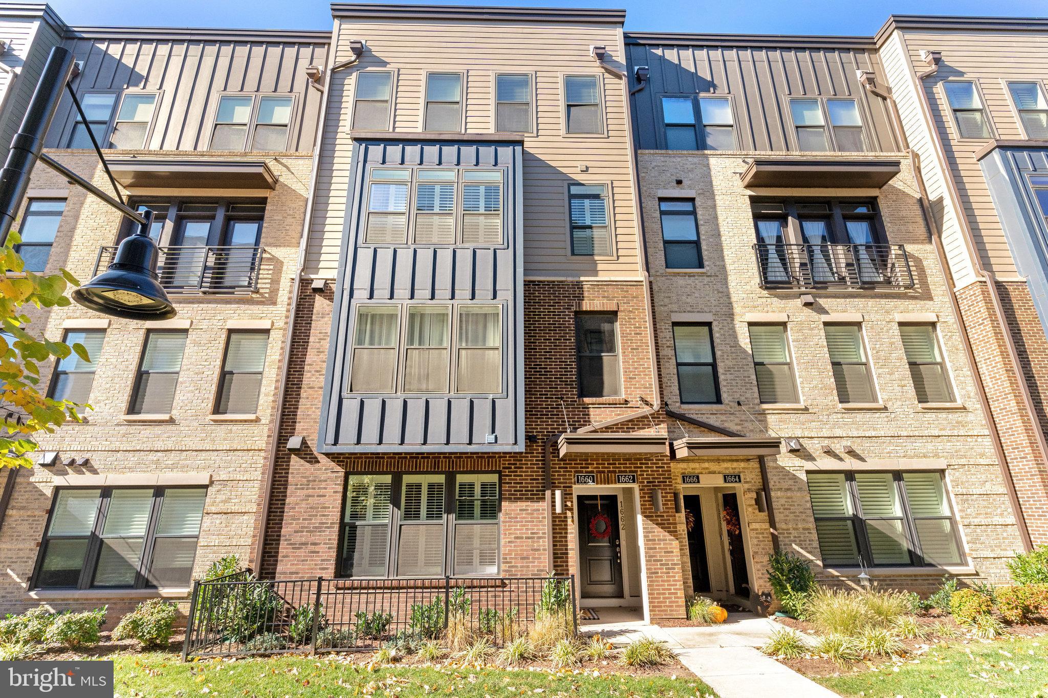 1660 Bandit Loop Reston, VA 20190 - Photo 1 of 39 front view of a building
