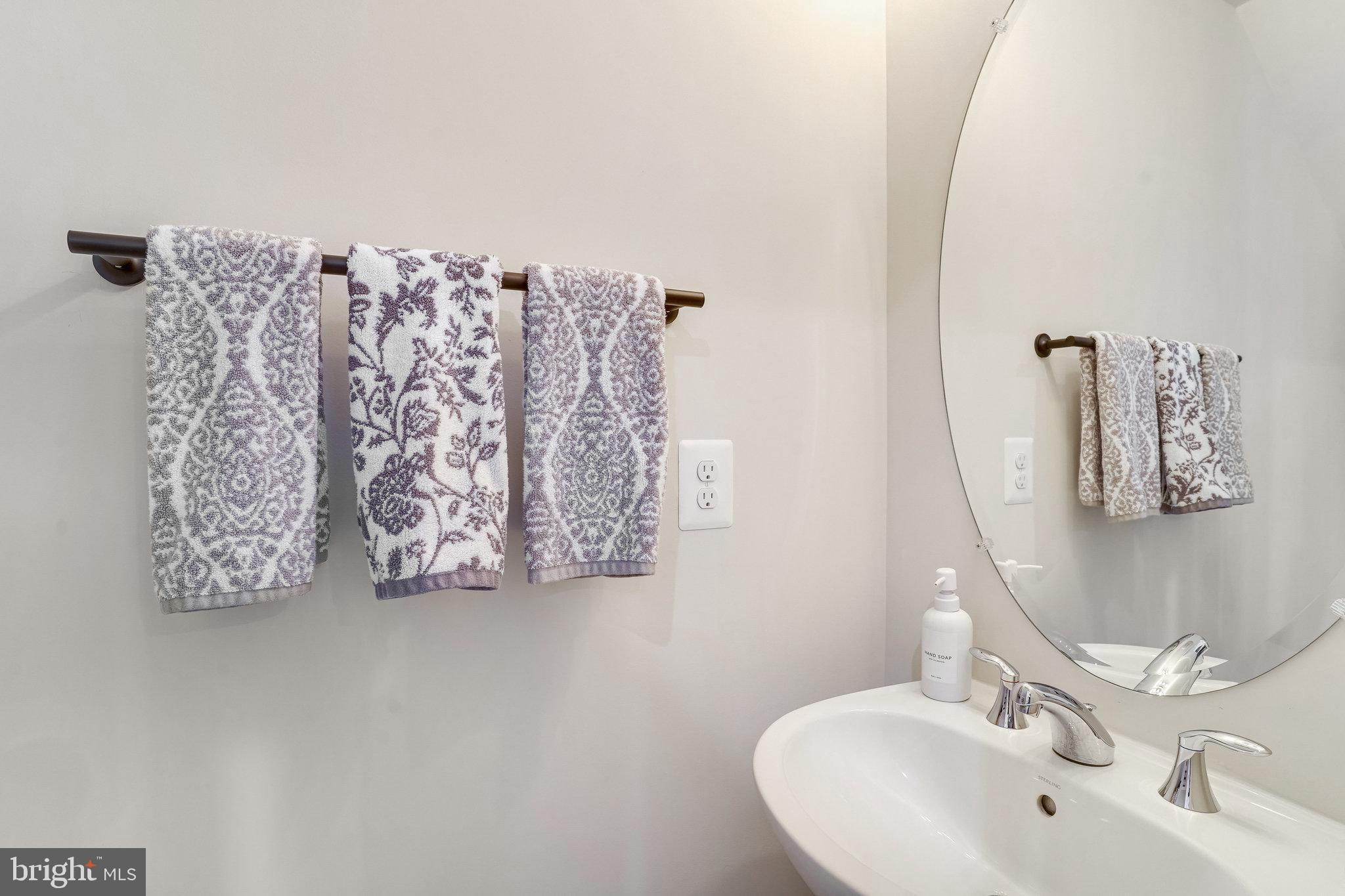 1660 Bandit Loop Reston, VA 20190 - Photo 11 of 39 a bathroom with a shower and a sink