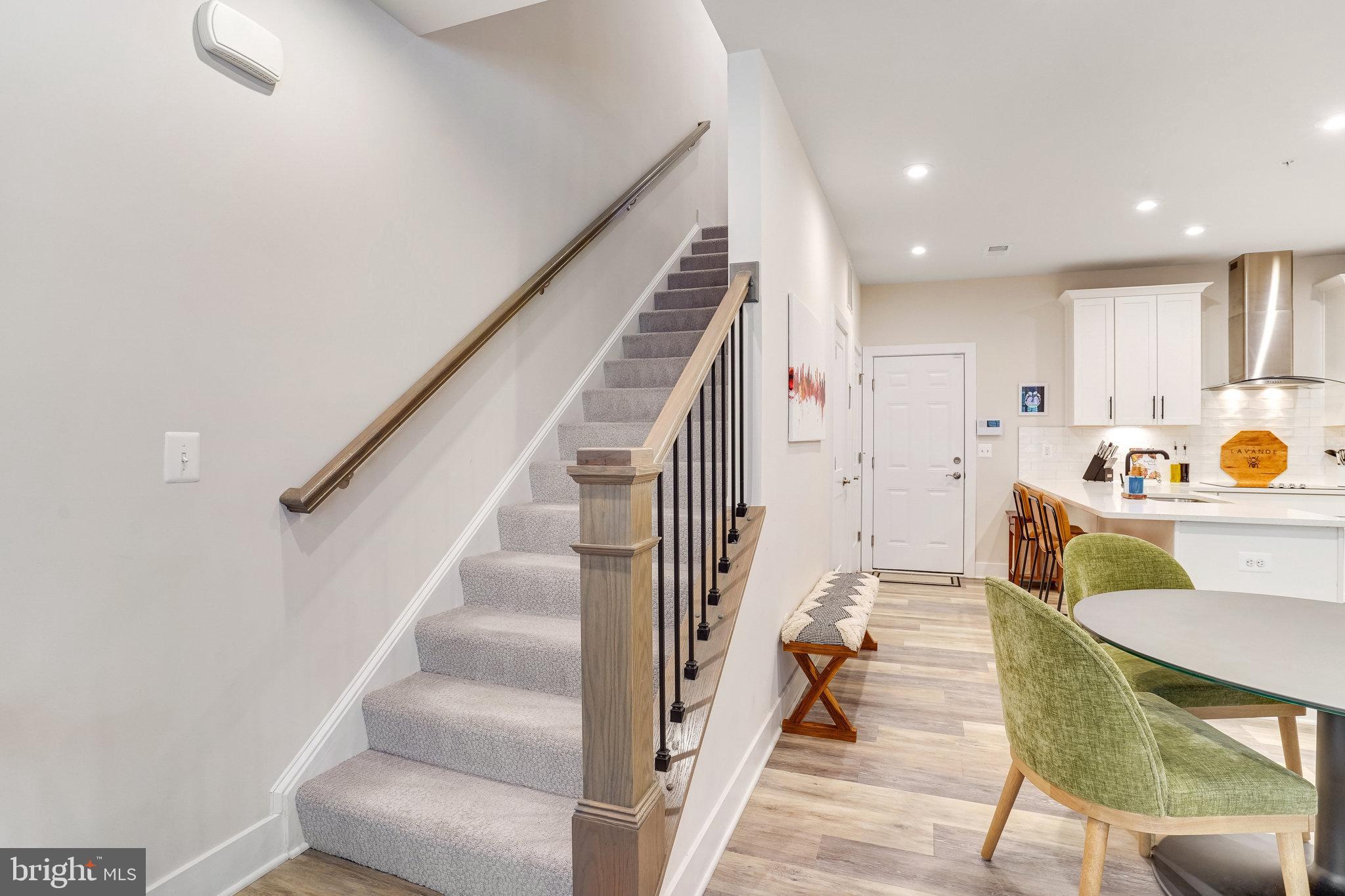 1660 Bandit Loop Reston, VA 20190 - Photo 12 of 39 a view of entryway and hall with wooden floor