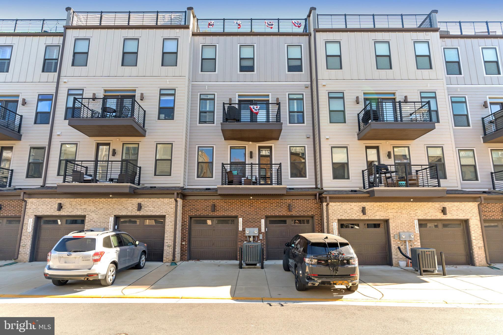 1660 Bandit Loop Reston, VA 20190 - Photo 24 of 39 a car parked in front of a building