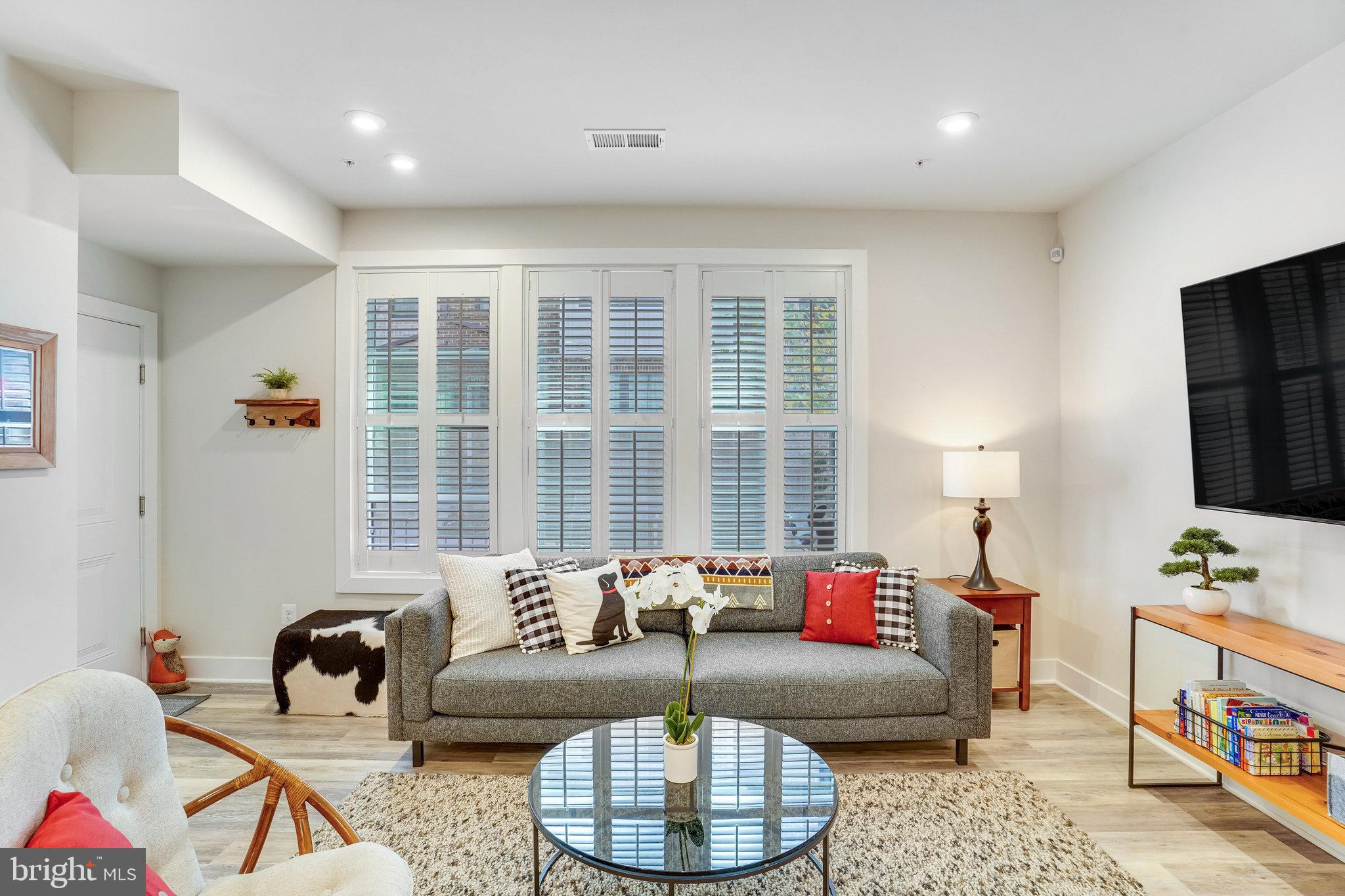 1660 Bandit Loop Reston, VA 20190 - Photo 3 of 39 a living room with furniture and a window