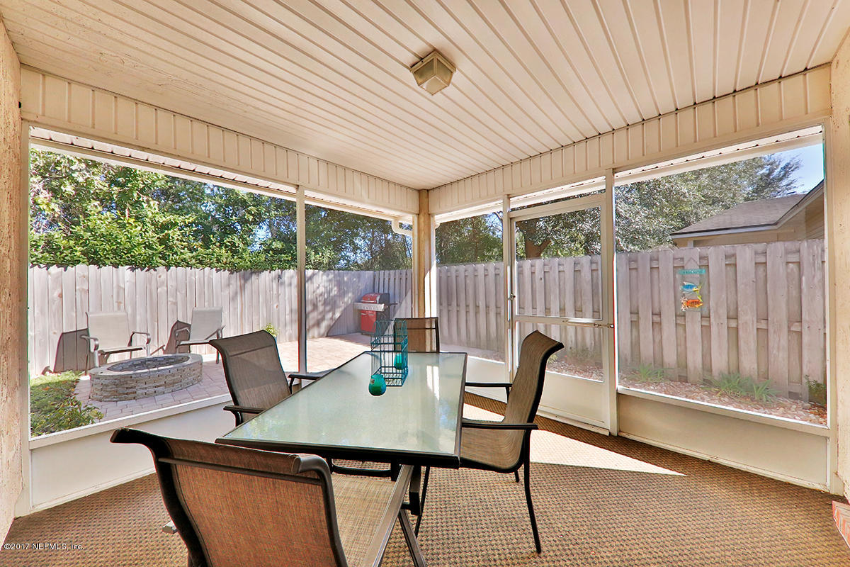 757 MacKenzie Circle St. Augustine, FL 32092 - Photo 27 of 31 a view of table and chair in balcony