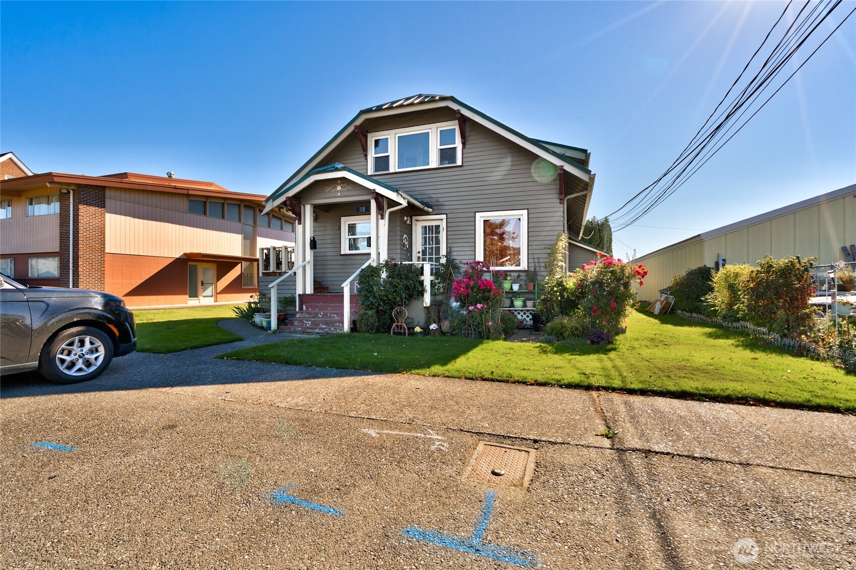118 East Victoria Avenue Burlington, WA 98233 - Photo 2 of 11 a front view of a house with garden