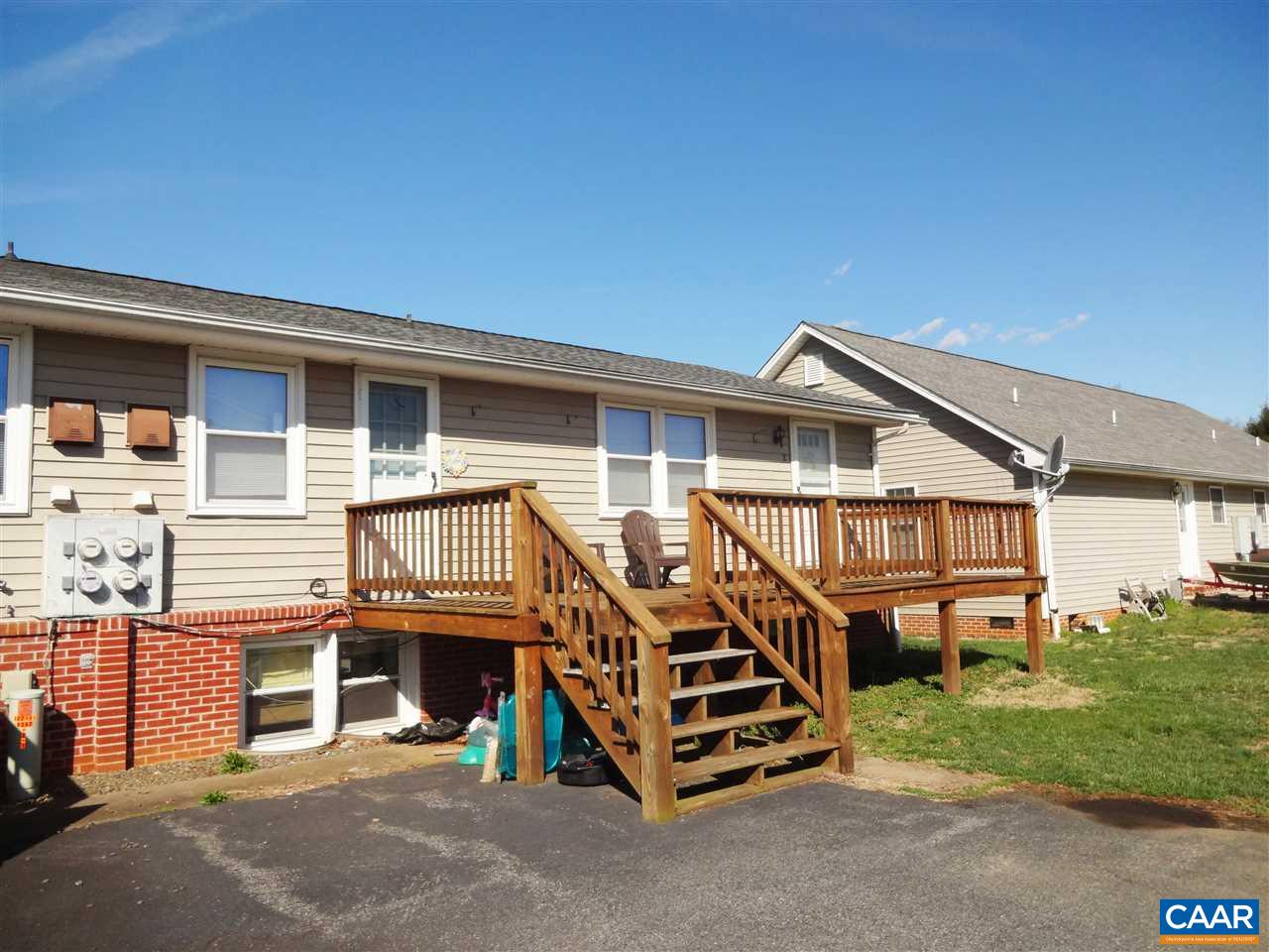 121 Abe Road Ruckersville, VA 22968 - Photo 7 of 28 a view of a house with a yard and deck