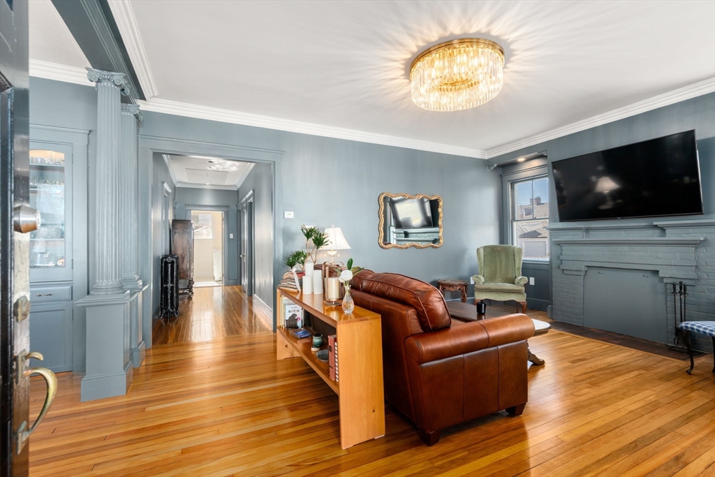 271 Atlantic Street Quincy, MA 02171 - Photo 13 of 24 a living room with furniture and a flat screen tv