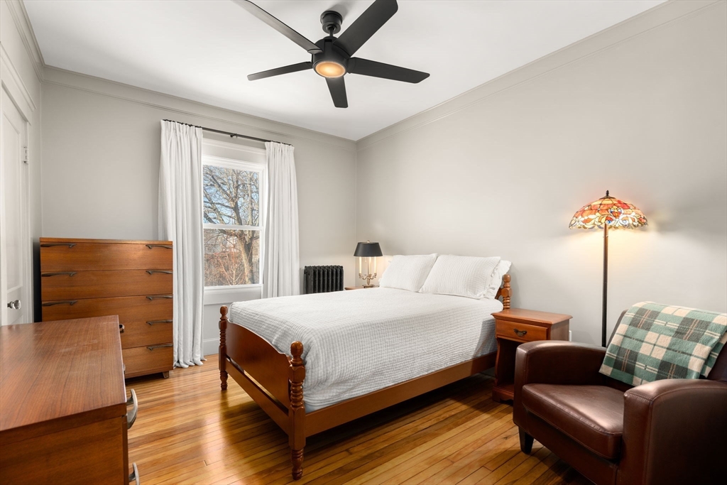 271 Atlantic Street Quincy, MA 02171 - Photo 19 of 24 a bedroom with a bed and a couch