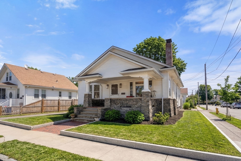 271 Atlantic Street Quincy, MA 02171 - Photo 2 of 24 a front view of a house with a yard
