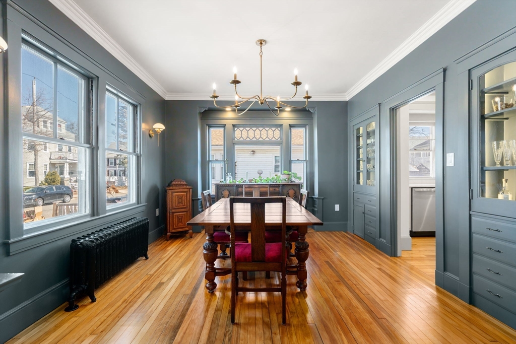 271 Atlantic Street Quincy, MA 02171 - Photo 10 of 24 a view of a dining room with furniture window and wooden floor