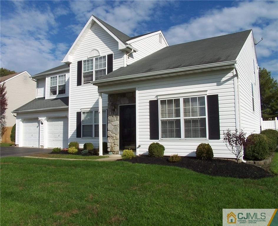 6 Nutmeg Road Aberdeen, NJ 07747 - Photo 3 of 24 a house view with a garden and garden