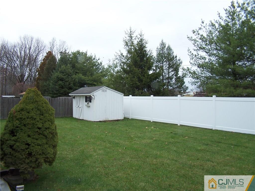 6 Nutmeg Road Aberdeen, NJ 07747 - Photo 22 of 24 a view of a back yard