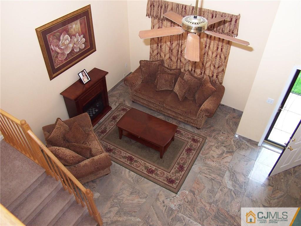 6 Nutmeg Road Aberdeen, NJ 07747 - Photo 7 of 24 a living room with furniture