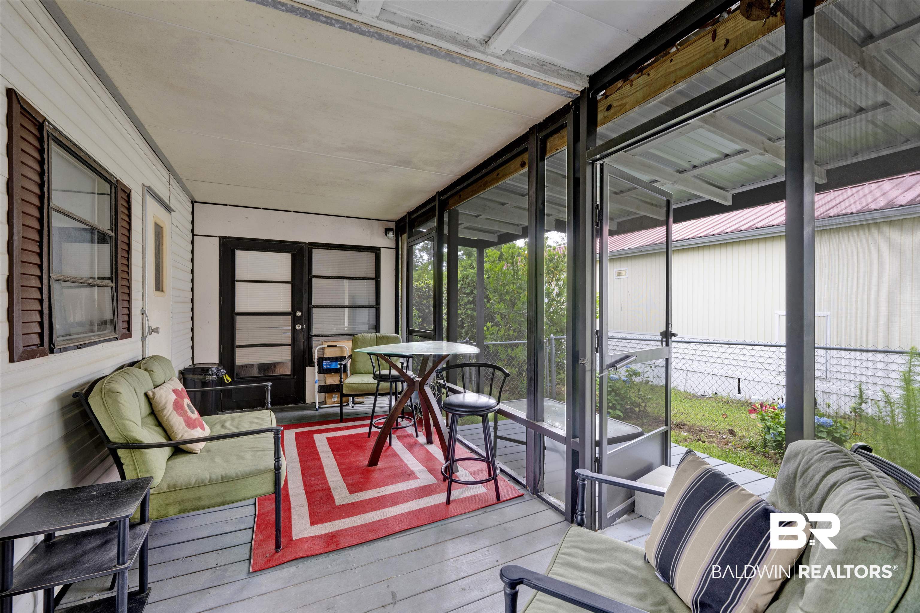 489 Elberta Loop Lillian, AL 36549 - Photo 15 of 42 Screened patio