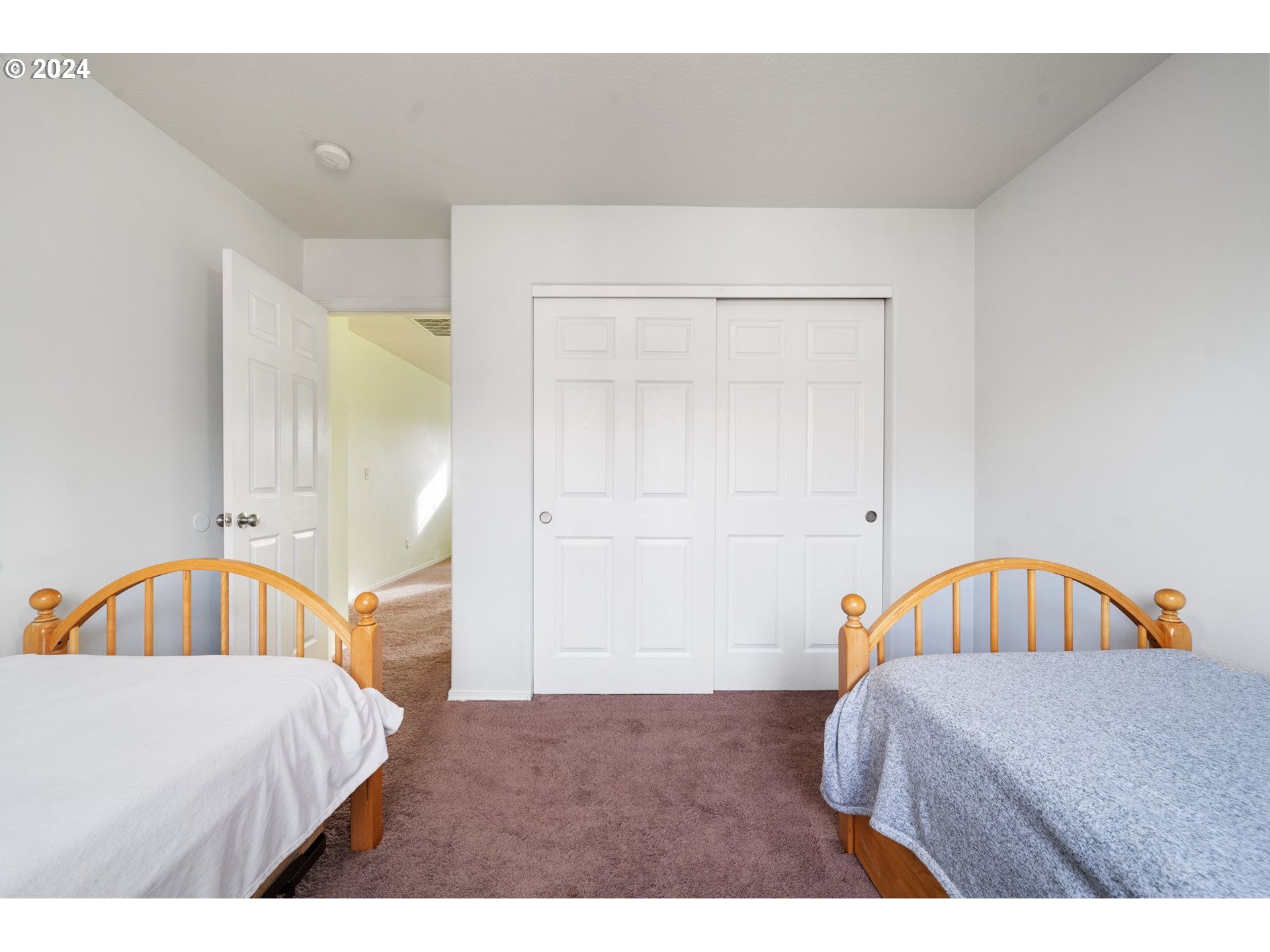 39833 Evans Street Sandy, OR 97055 - Photo 20 of 37 a bedroom with a bed and a window
