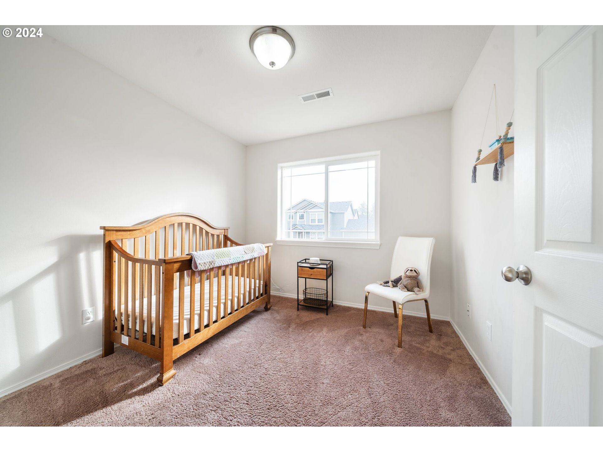 39833 Evans Street Sandy, OR 97055 - Photo 21 of 37 a bedroom with furniture and a window