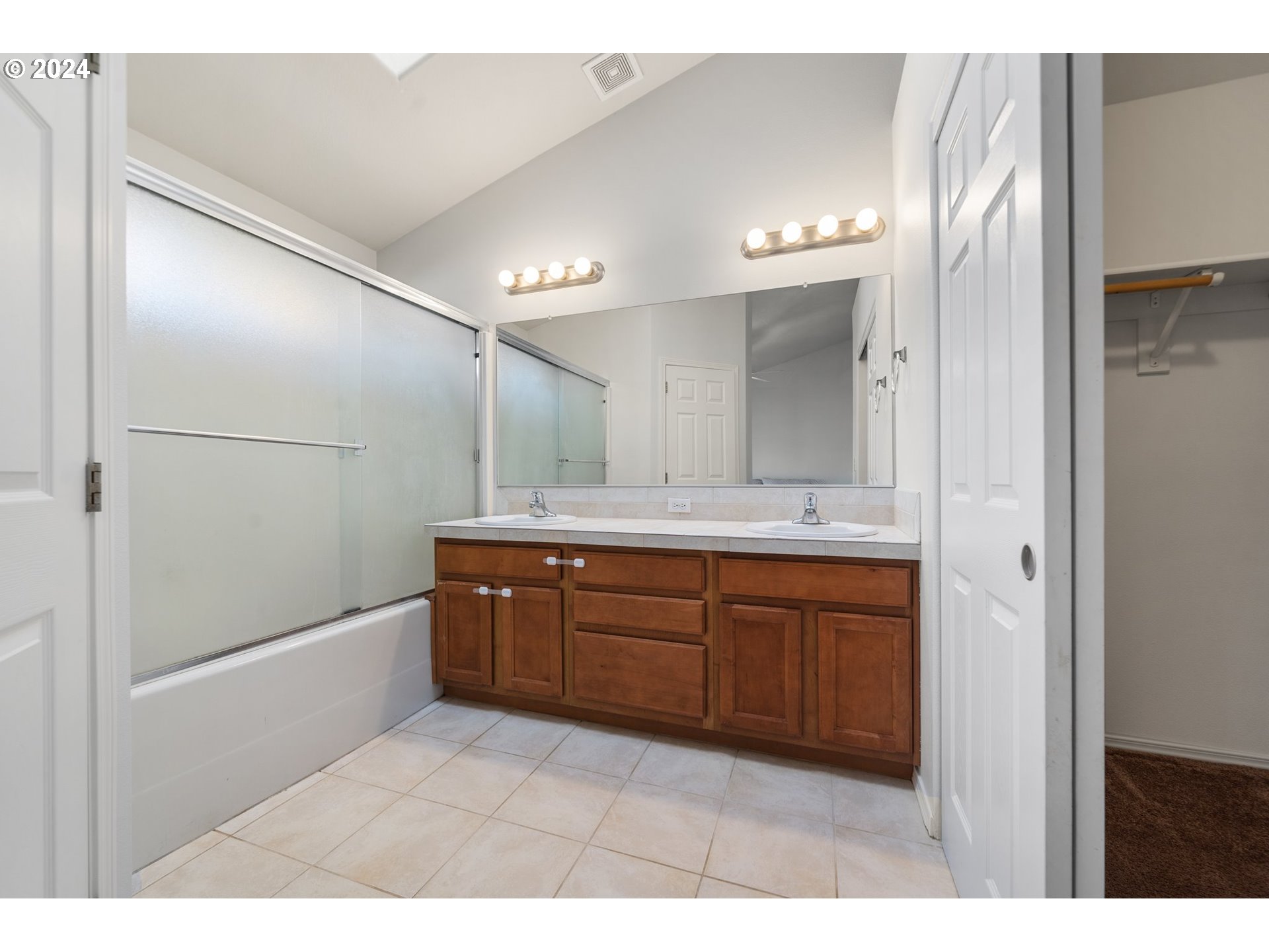 39833 Evans Street Sandy, OR 97055 - Photo 25 of 37 a bathroom with a granite countertop sink mirror and bathtub
