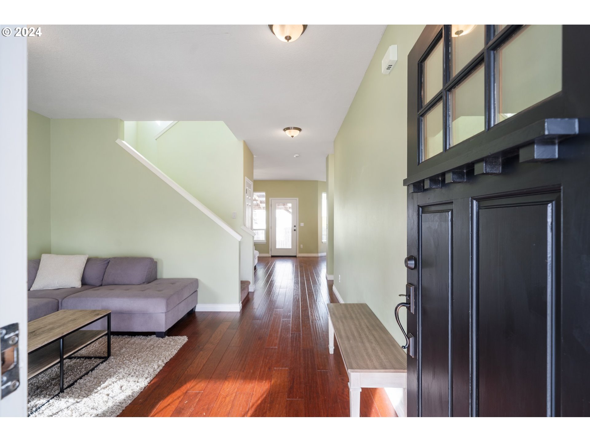 39833 Evans Street Sandy, OR 97055 - Photo 4 of 37 a hallway with couches and wooden floor