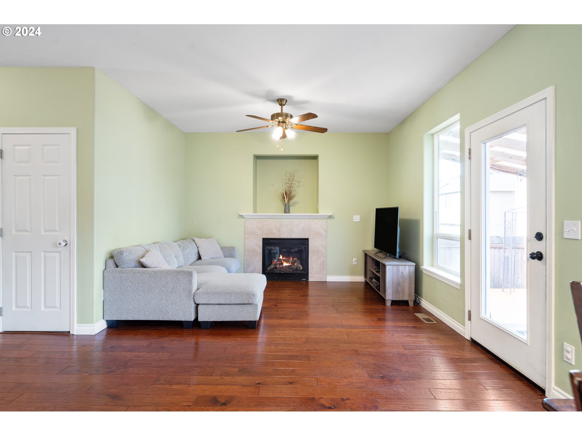 39833 Evans Street Sandy, OR 97055 - Photo 8 of 37 a living room with furniture and a fireplace