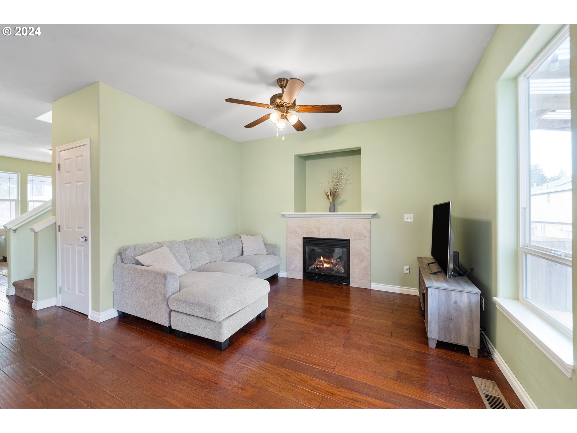 39833 Evans Street Sandy, OR 97055 - Photo 9 of 37 a living room with furniture and a fireplace
