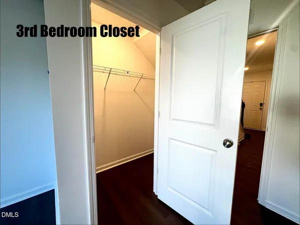 a bathroom with a shower and a mirror