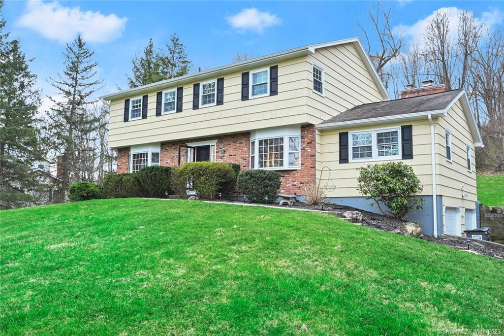 32 East Gate Road Danbury, CT 06811 - Photo 1 of 1 front view of a house with a yard